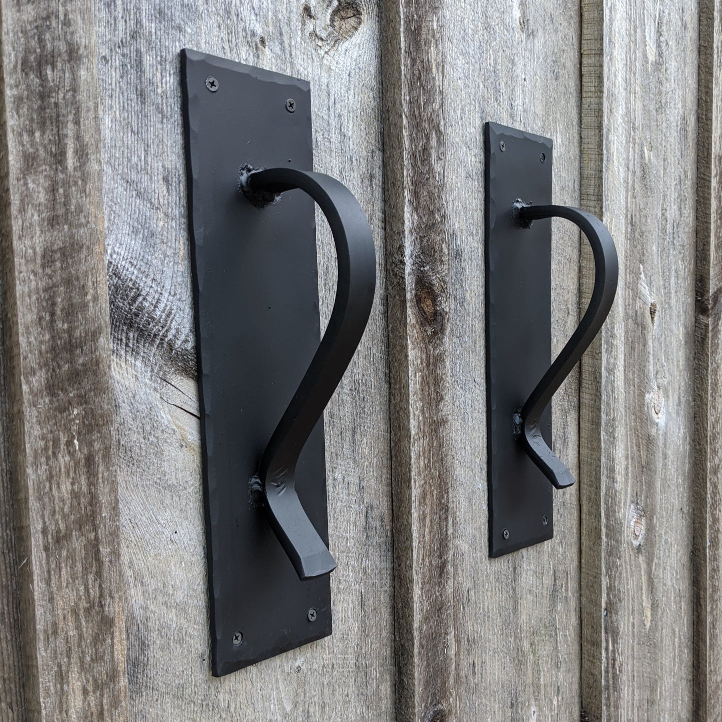Large Gracefully Curved Blacksmith Made Door Pulls on Sturdy Backplate