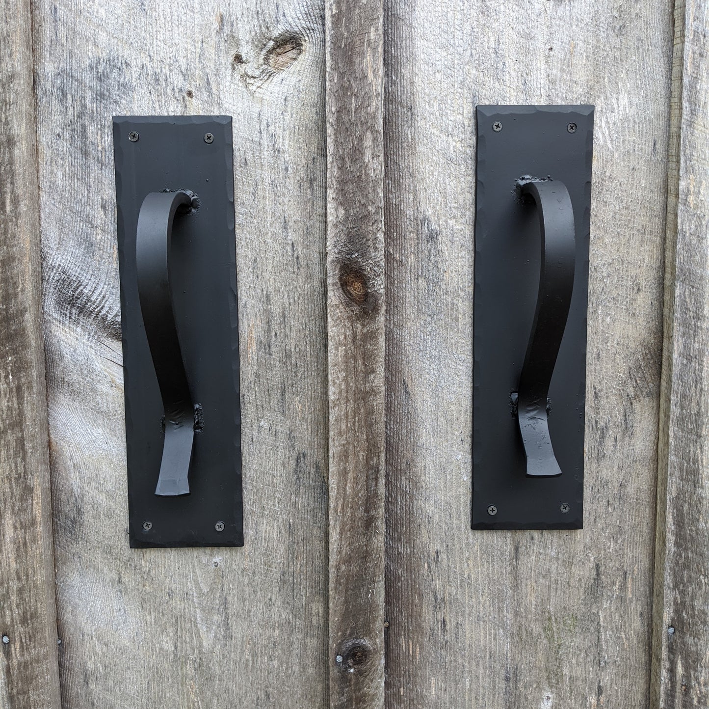 Large Gracefully Curved Blacksmith Made Door Pulls on Sturdy Backplate
