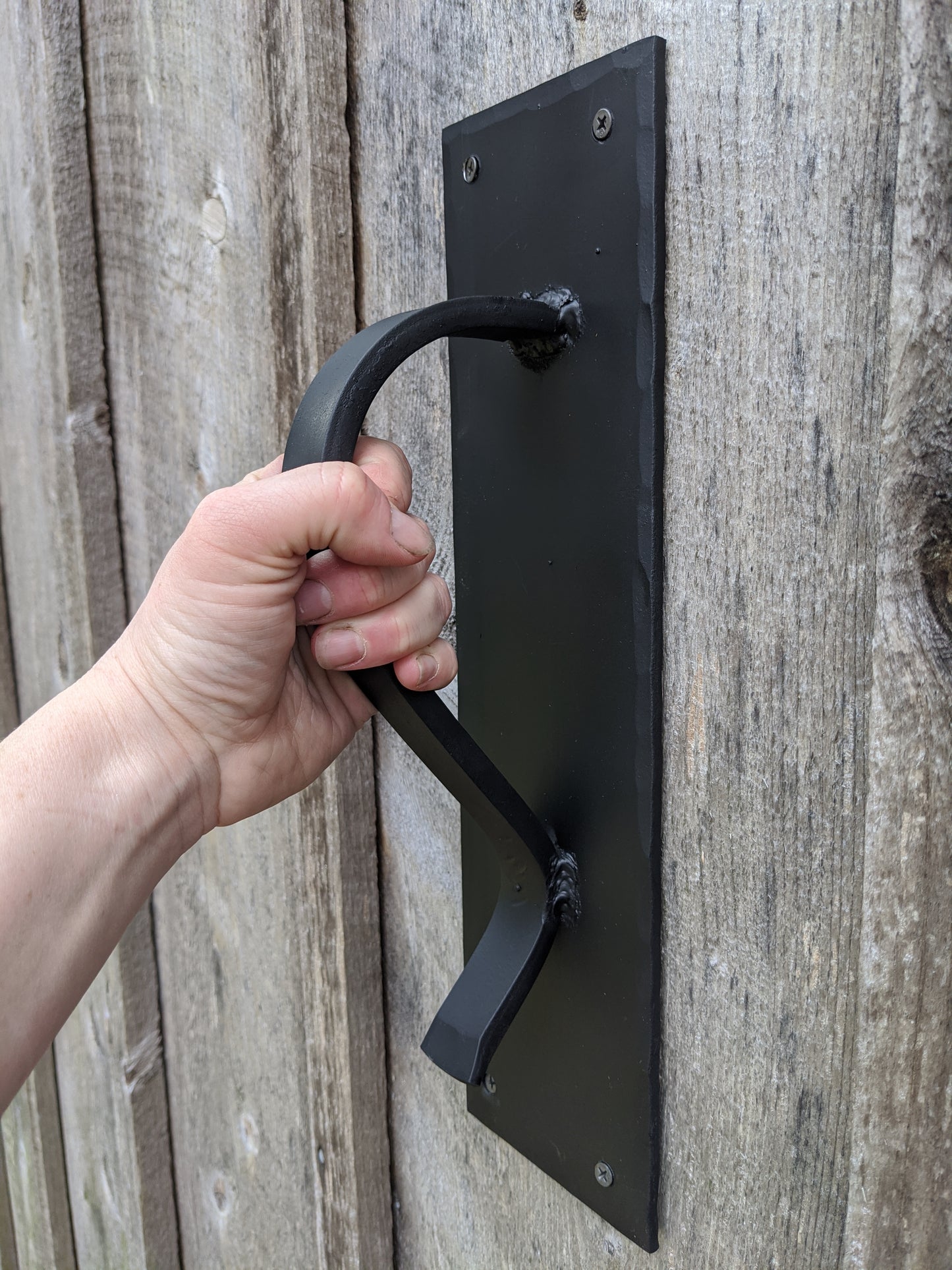 Large Gracefully Curved Blacksmith Made Door Pulls on Sturdy Backplate