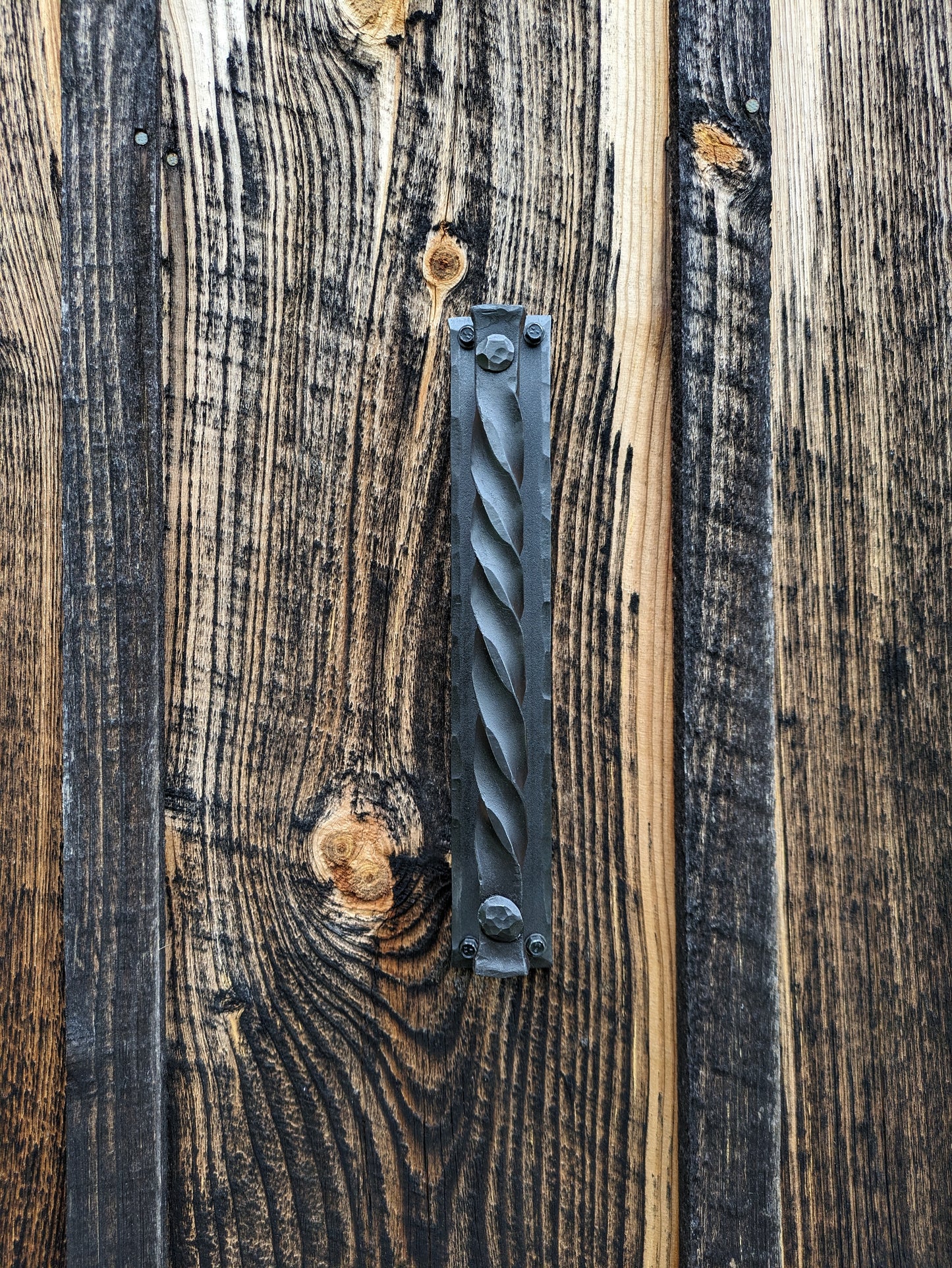 Single Hand Forged Large Twisted Handle on Sturdy Backplate