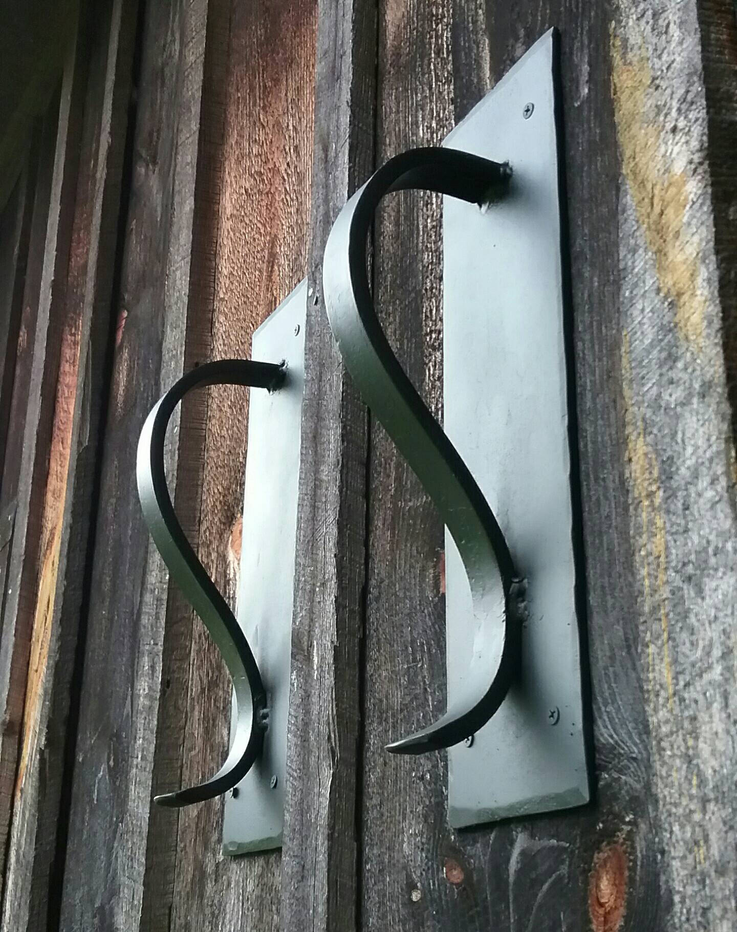 Large Gracefully Curved Blacksmith Made Door Pulls on Sturdy Backplate