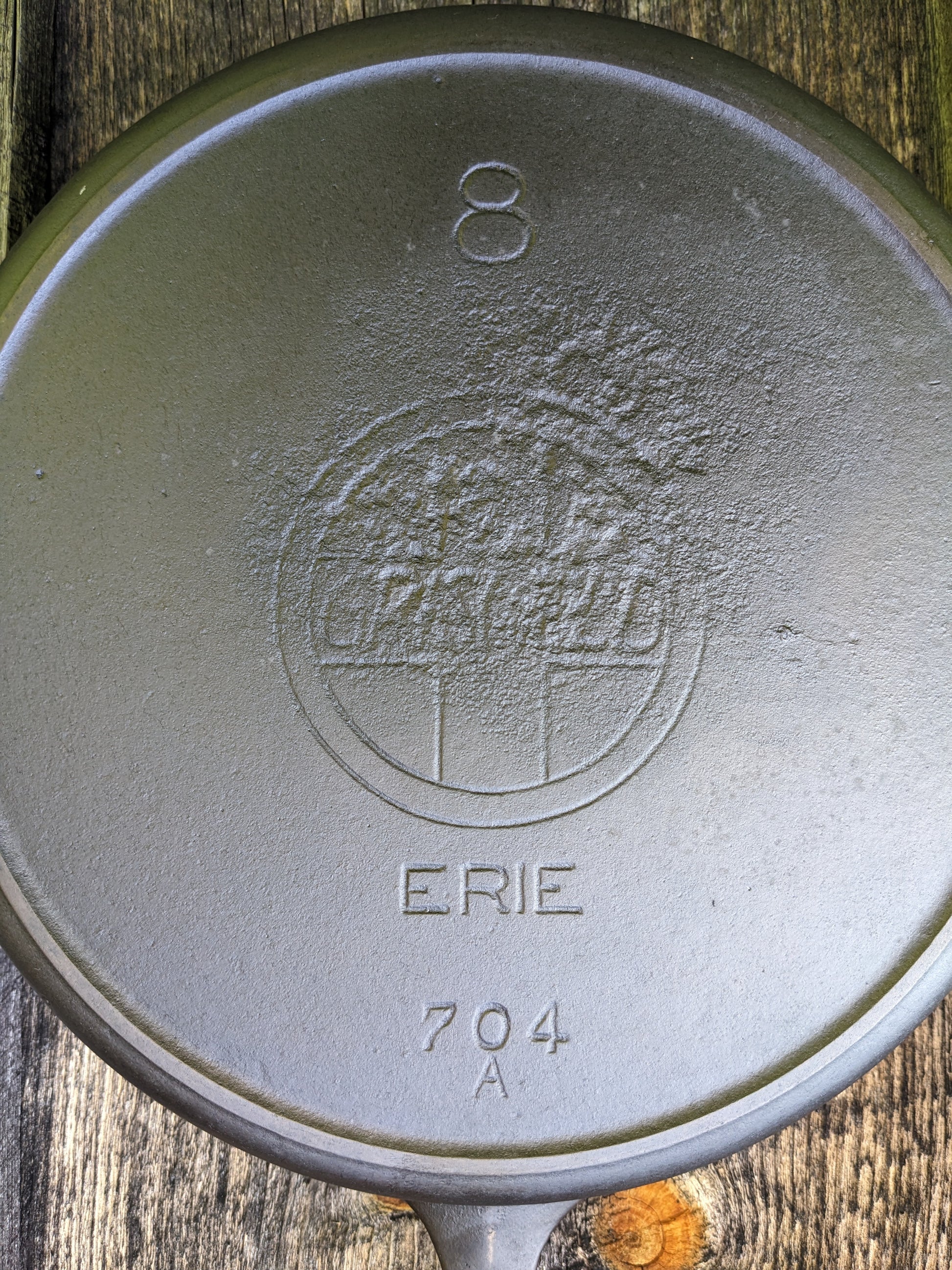 Sold at Auction: Antique Erie Griswold #8 Cast Iron Skillet, Large Slant  Logo #704N, Heat Ring, EC